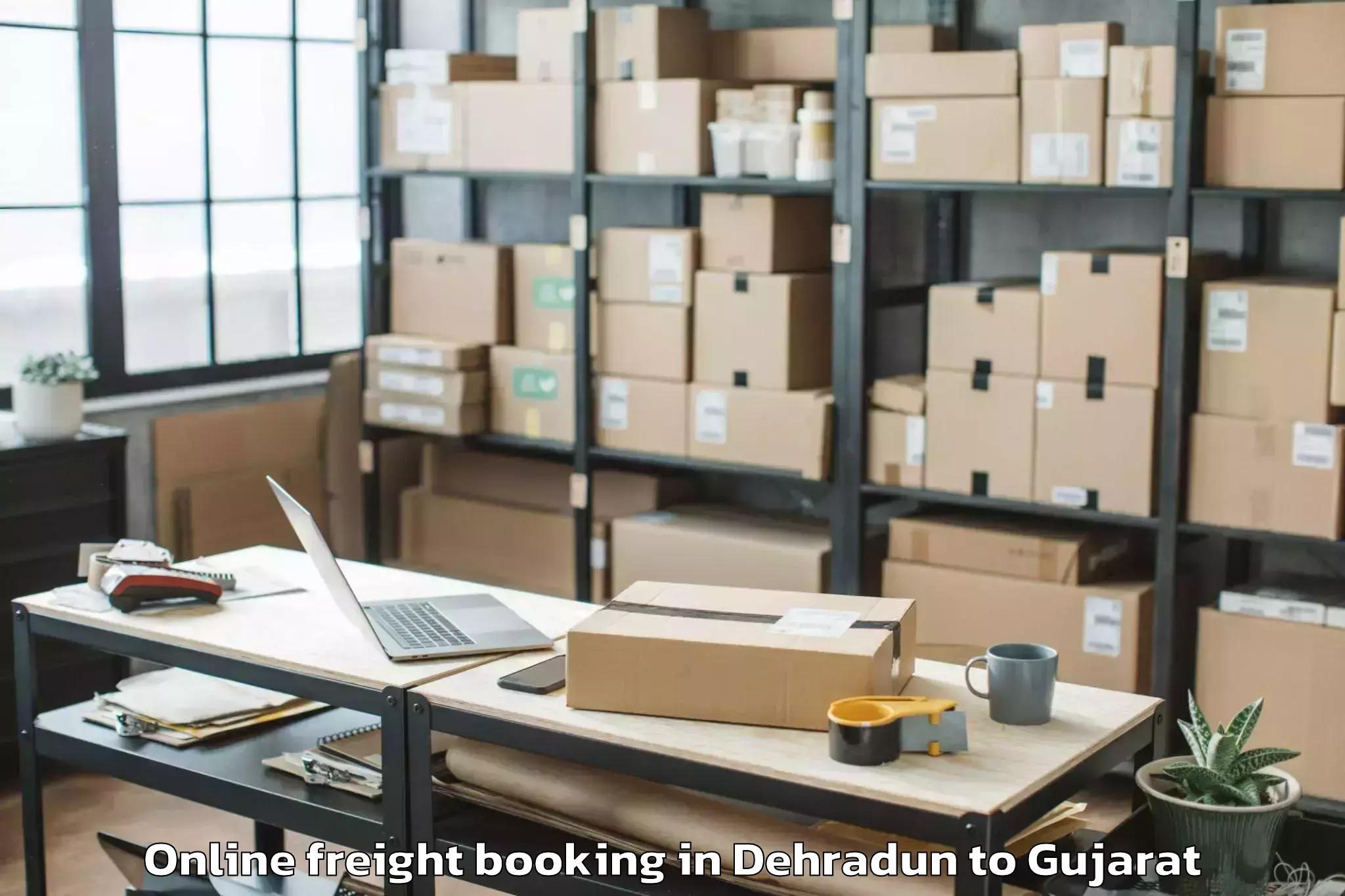 Affordable Dehradun to Lavad Online Freight Booking